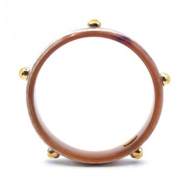 15mm clear horn bracelet set in gold...