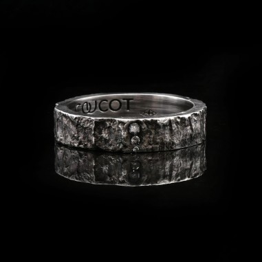 Men's wedding ring with white diamond...