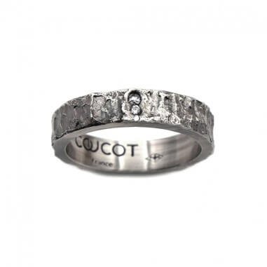 Men's wedding ring with white diamond...