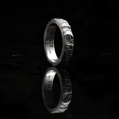 Men's wedding ring with white diamond...
