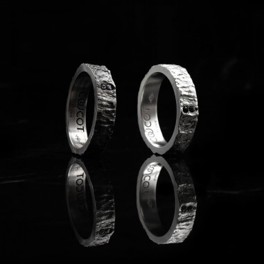 Men's wedding ring with white diamond...
