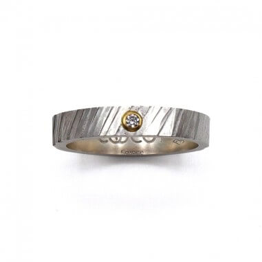 Two-tone wedding band with diamond -...