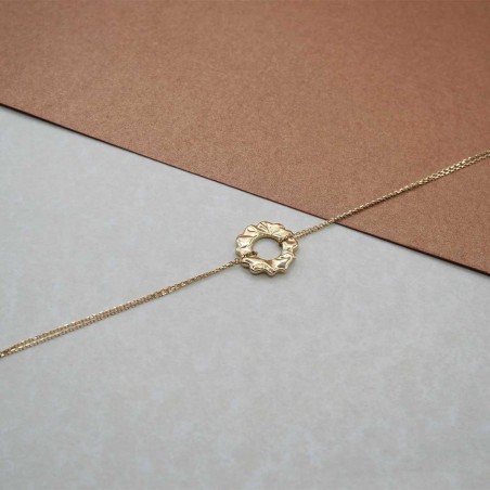 Photo sur fond papier du bracelet chaine femme Hélios.