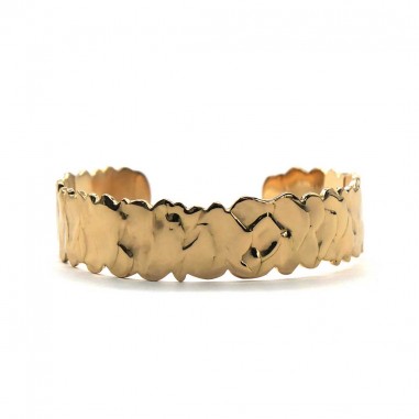 Photo sur fond blanc de la manchette en or vue de devant.