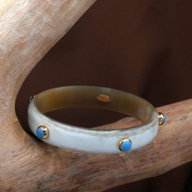 15mm clear horn bracelet set in gold...
