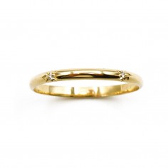 Photo sur fond blanc de l’alliance étoile en or modèle Taygète vue de dessus.