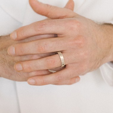 Men's wedding ring with black diamond...